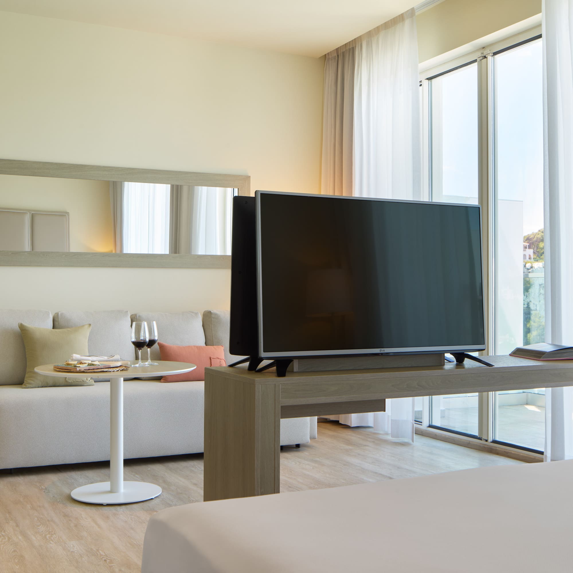a television on a table in a room