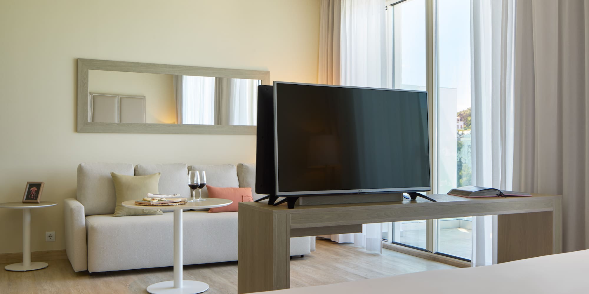 a television on a table in a room