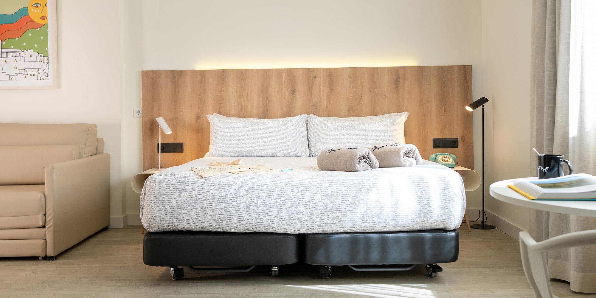 a bed with two pillows