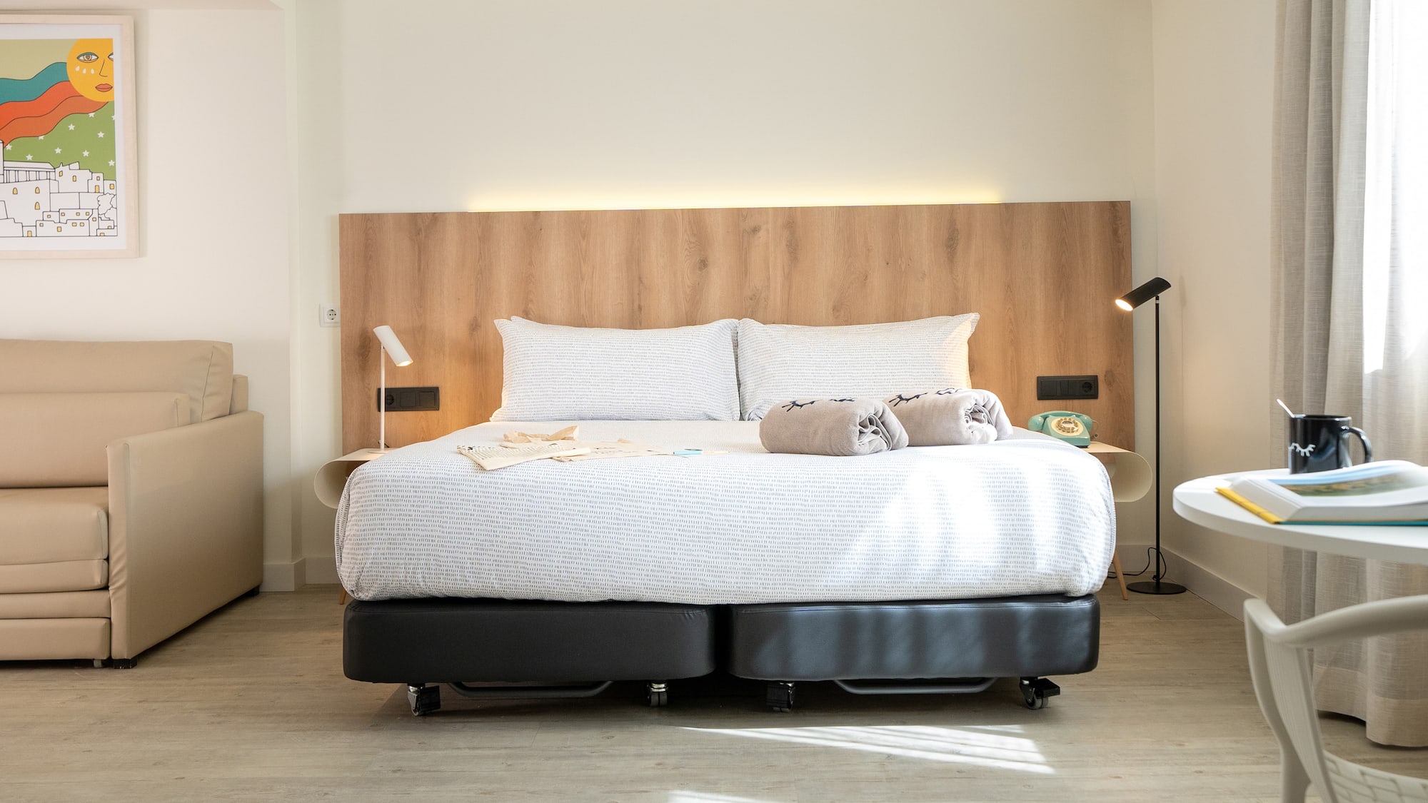 a bed with two pillows