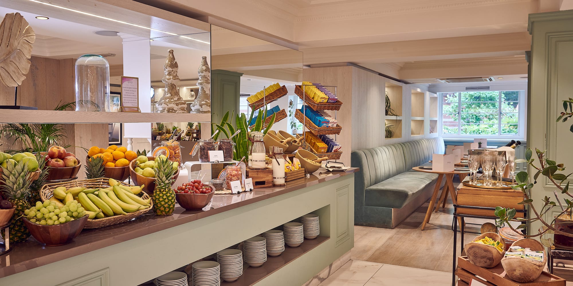 a room with a buffet and a table with food