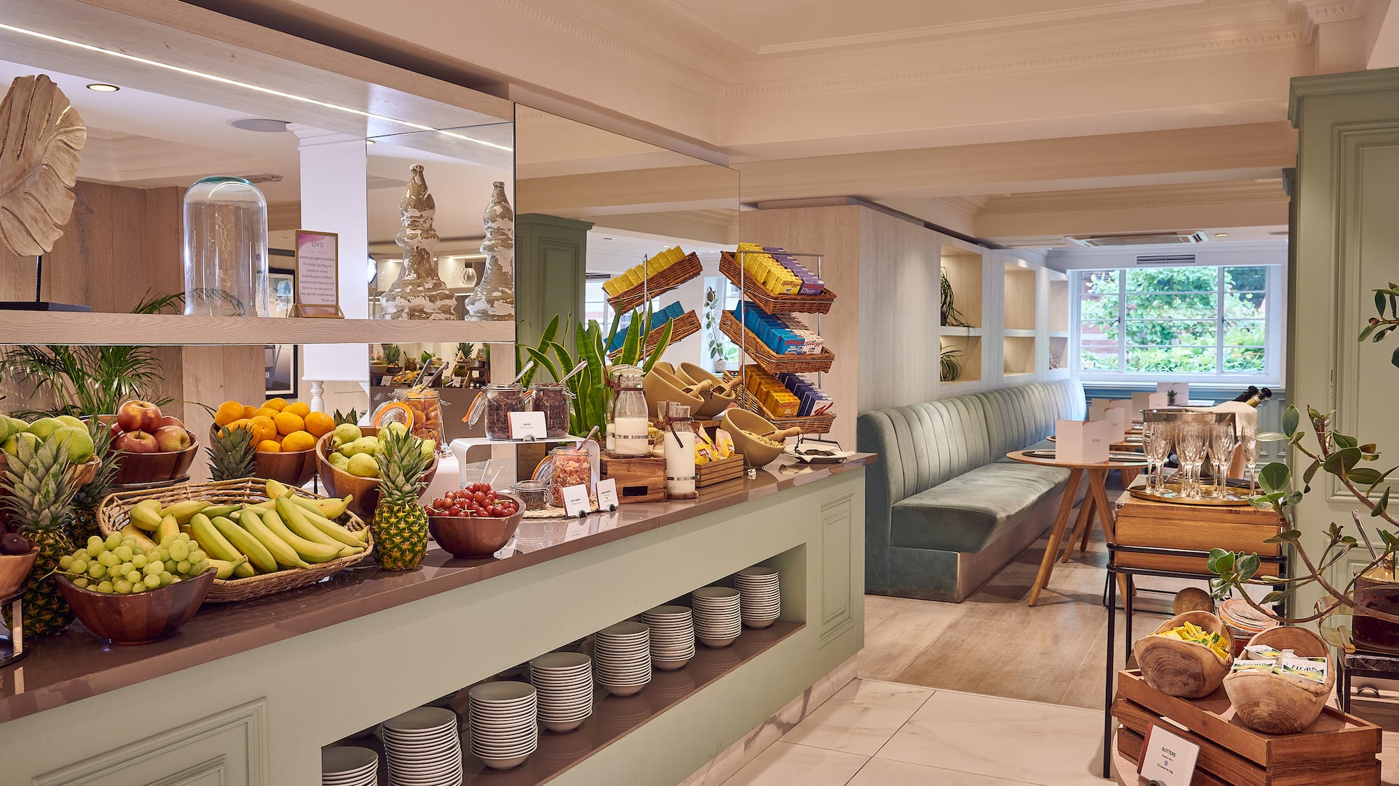 a room with a buffet and a table with food