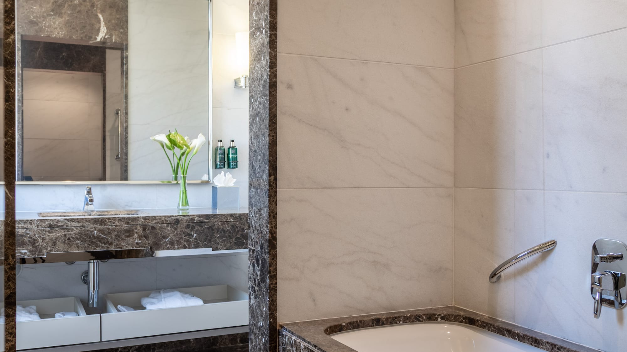 a bathroom with a bathtub and sink