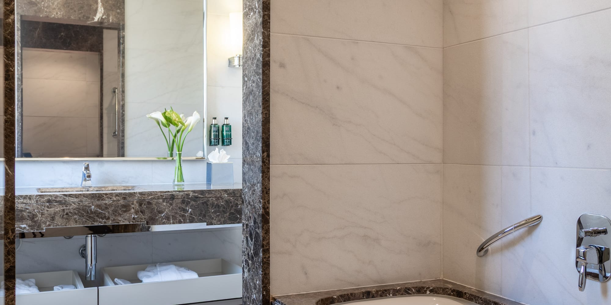 a bathroom with a bathtub and sink