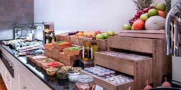a counter with various foods on it