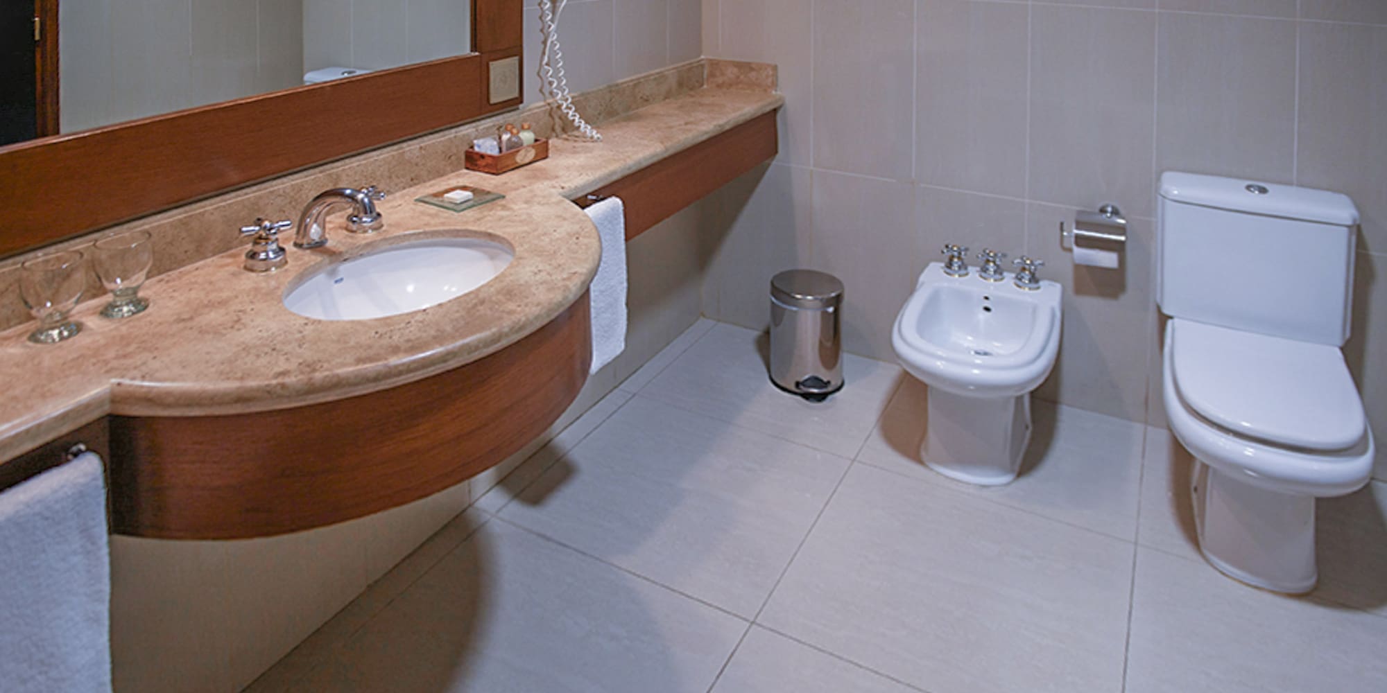 a bathroom with a sink and toilet