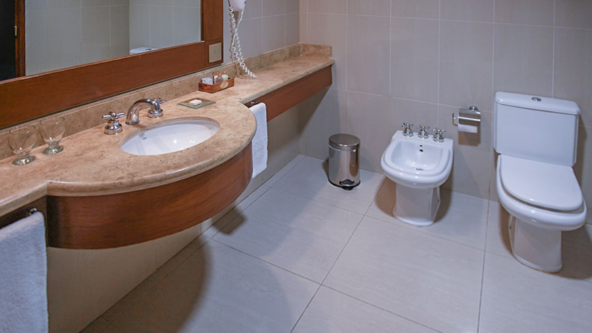 a bathroom with a sink and toilet