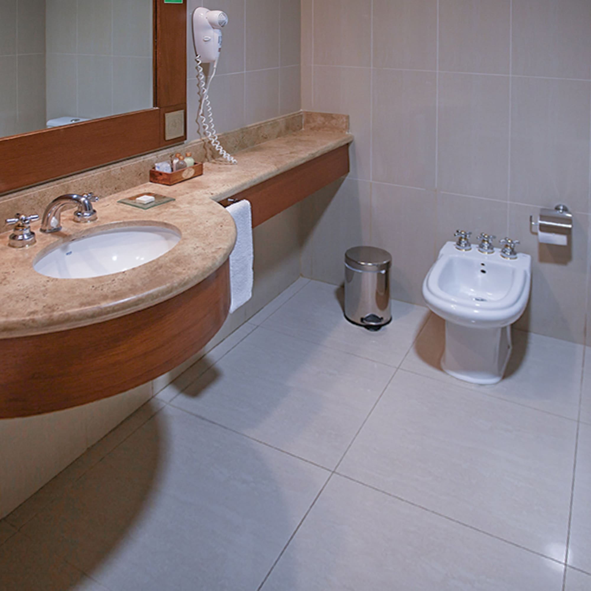 a bathroom with a sink and toilet