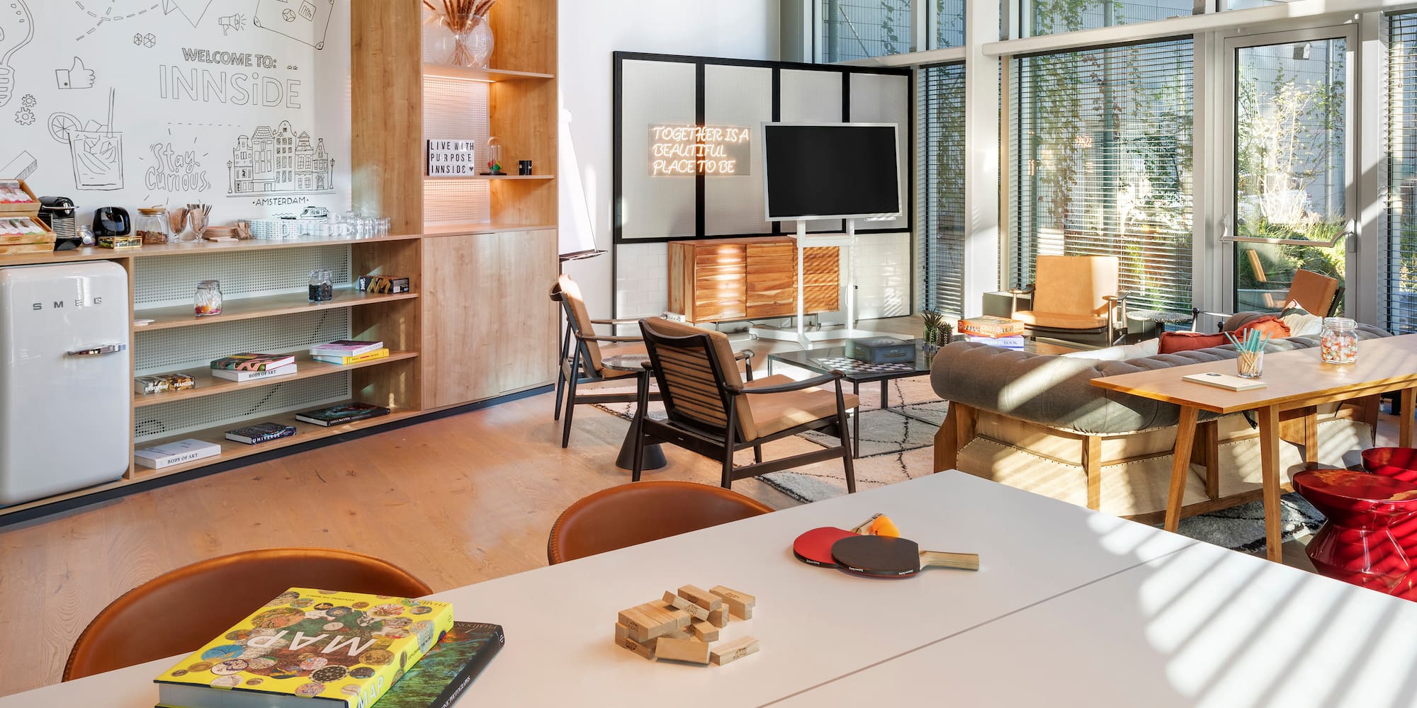 a room with a tv and table