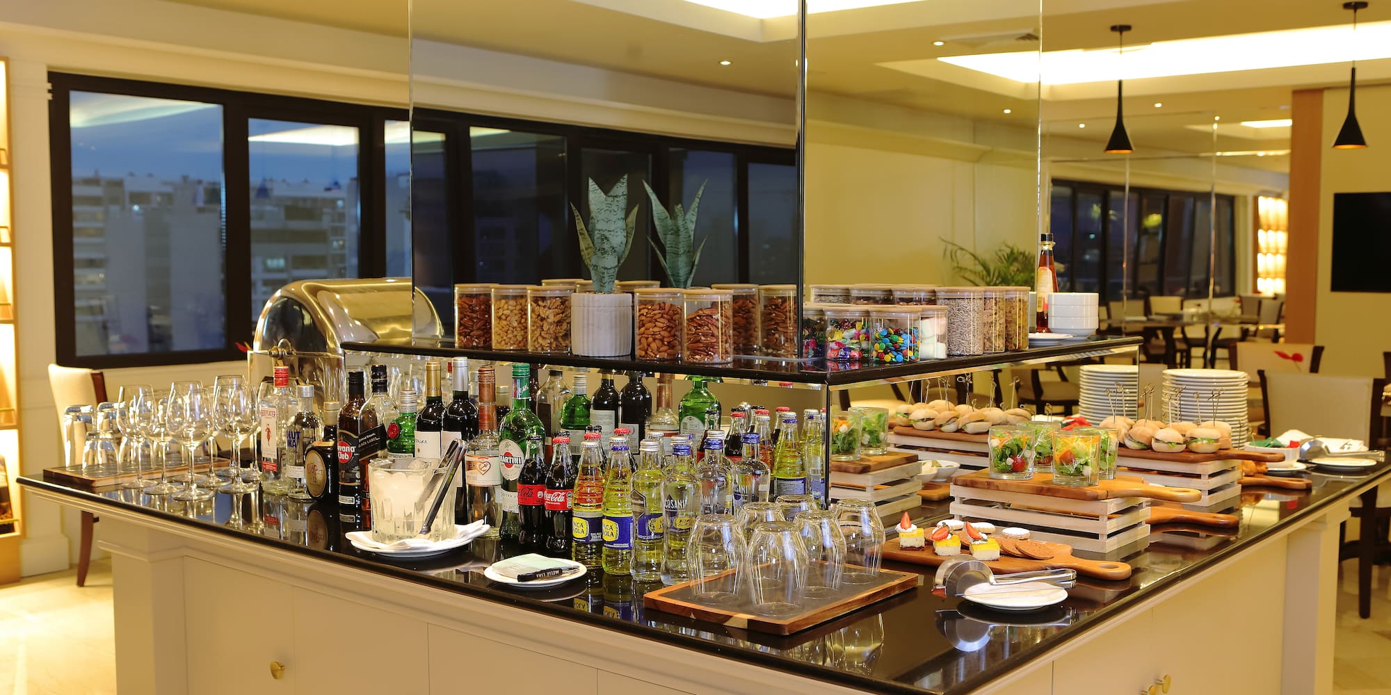 a buffet table with food and drinks