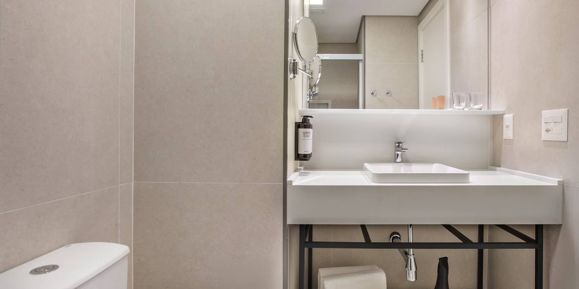 a bathroom with a sink and a toilet