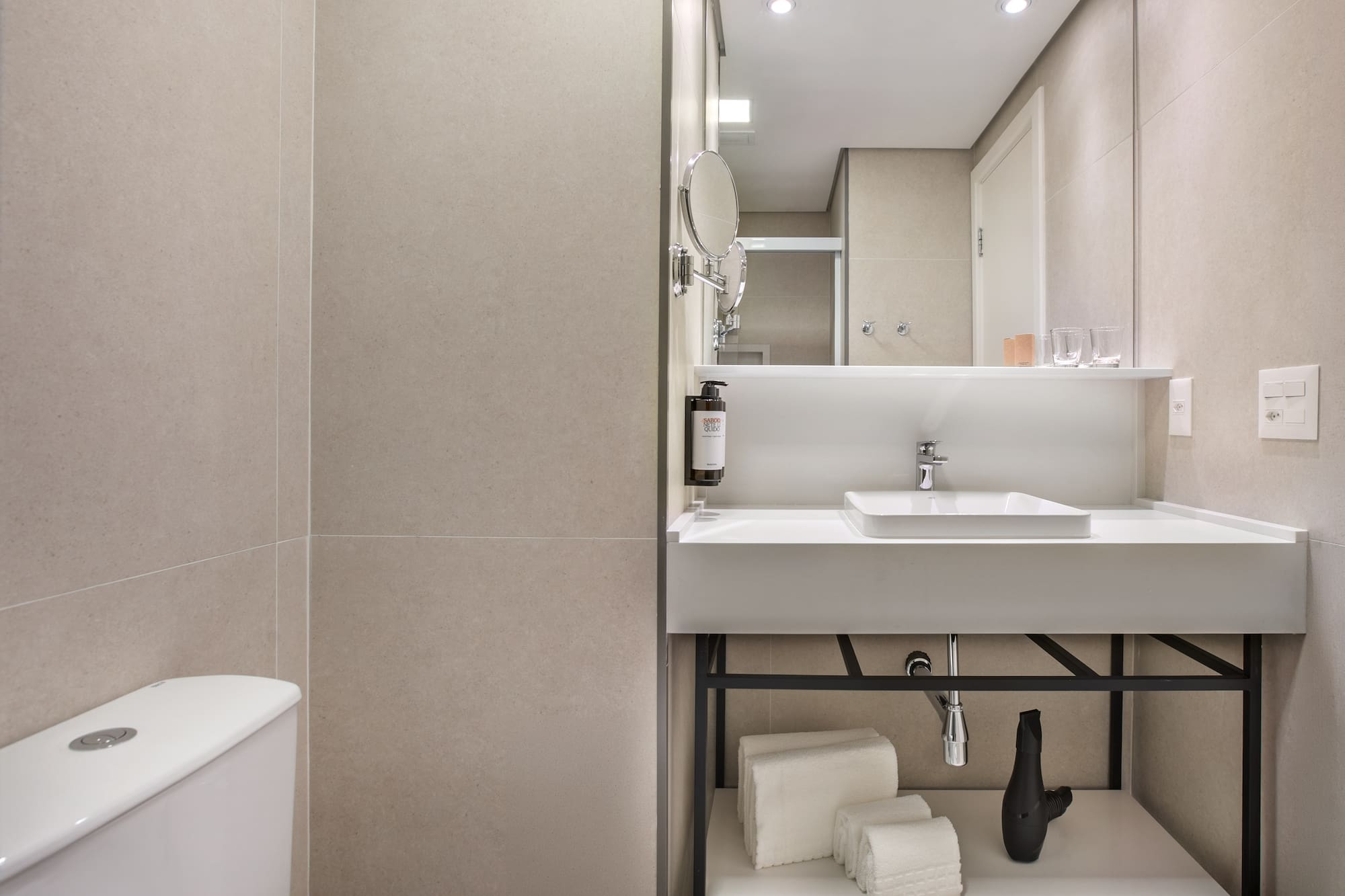 a bathroom with a sink and a toilet