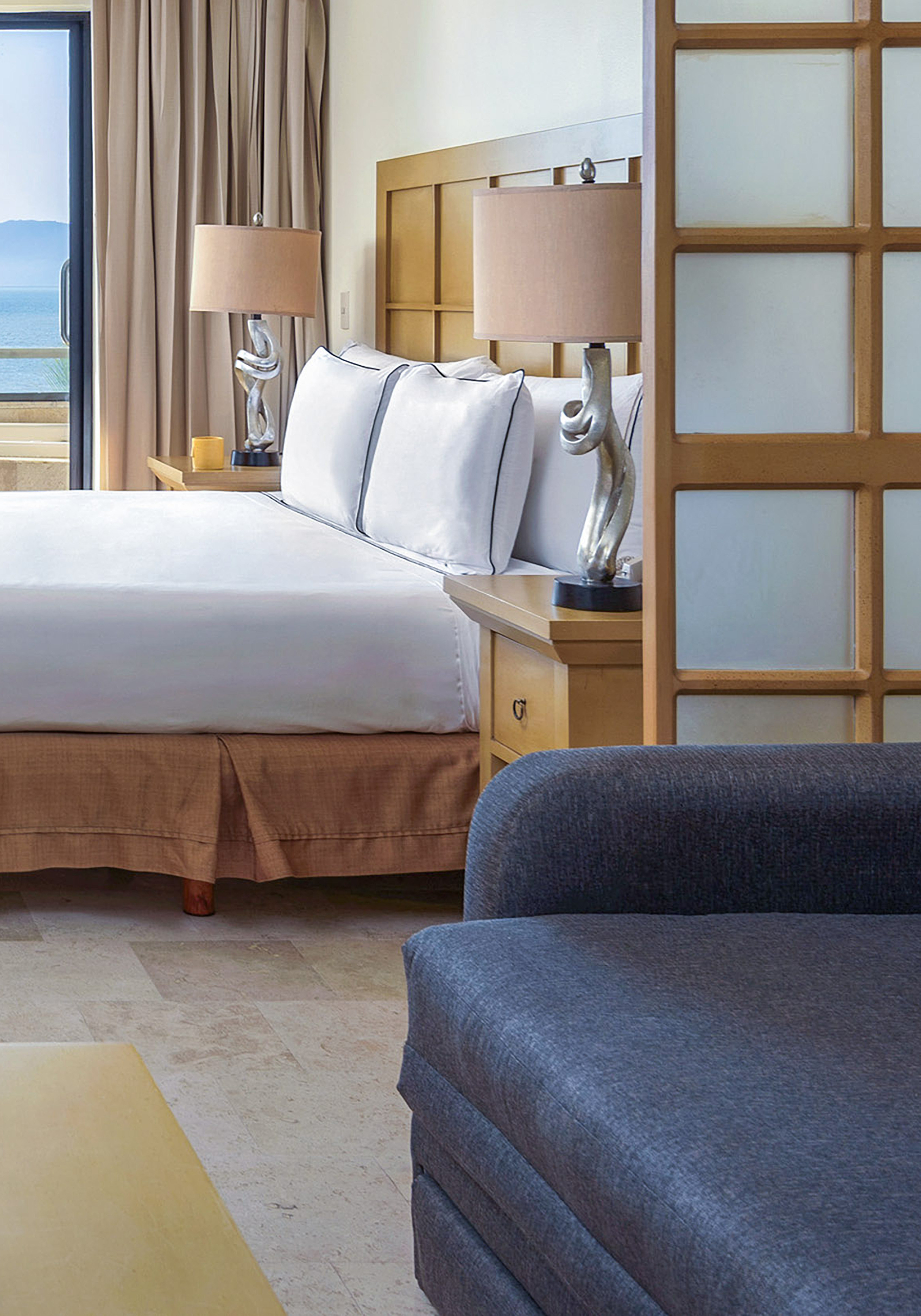 a room with a bed and a couch