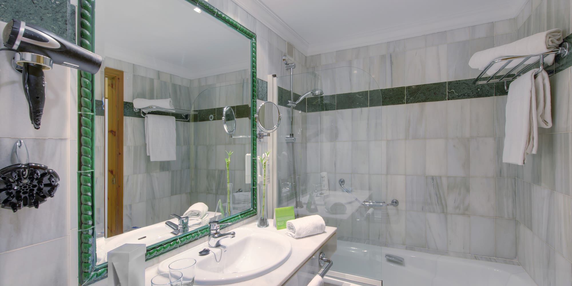 a bathroom with a large mirror