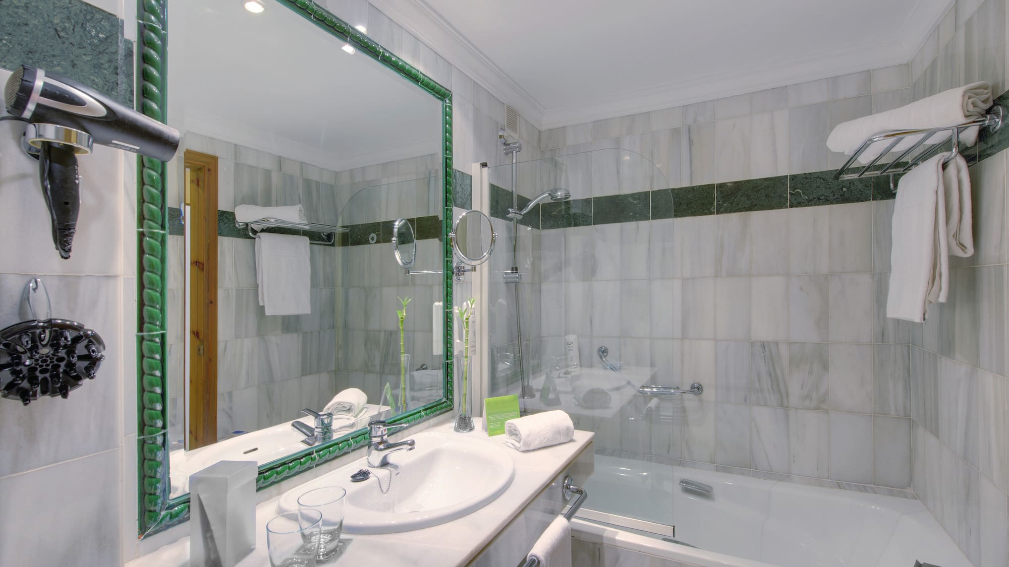 a bathroom with a large mirror