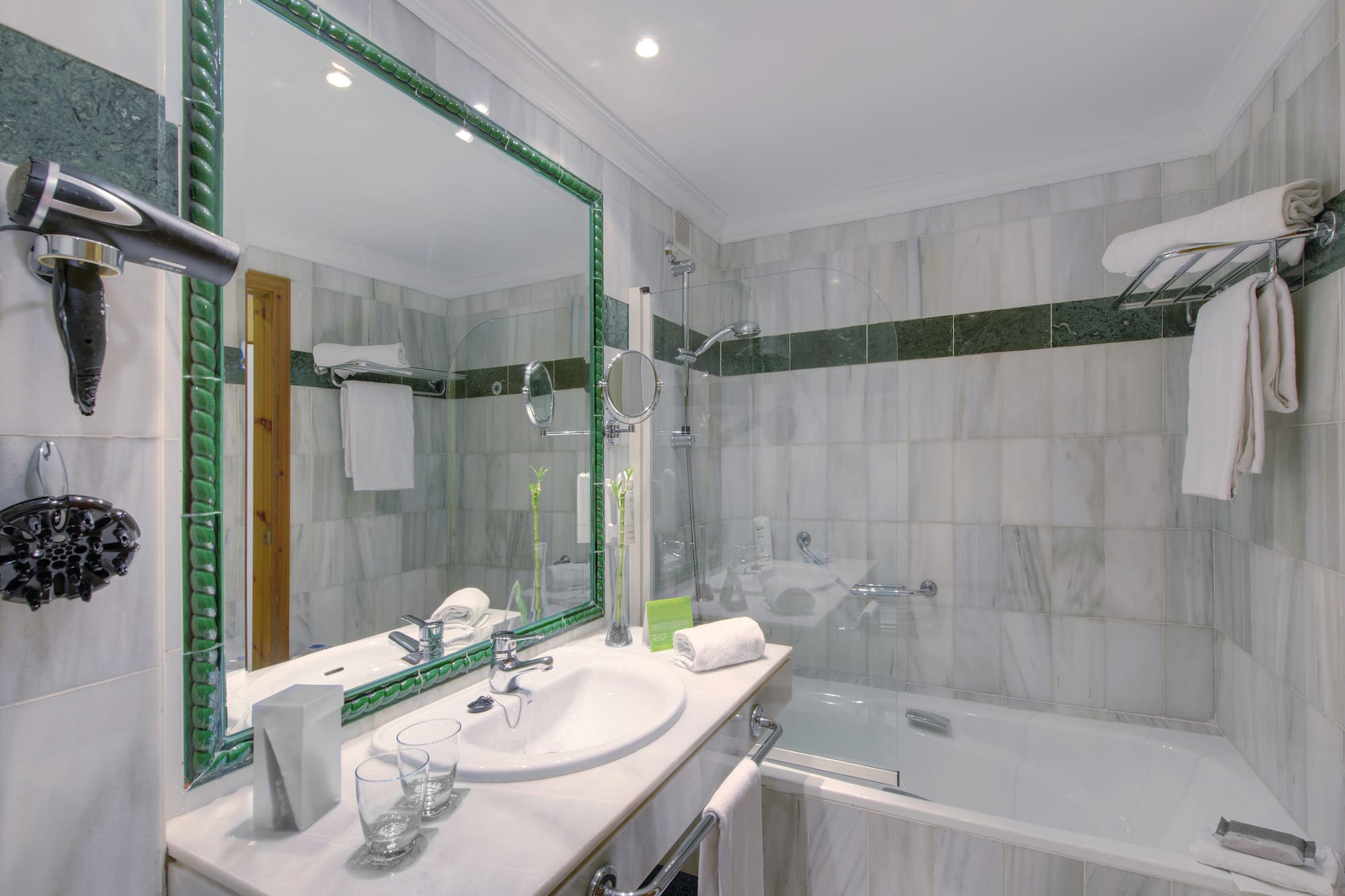 a bathroom with a large mirror