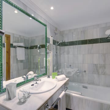 a bathroom with a large mirror