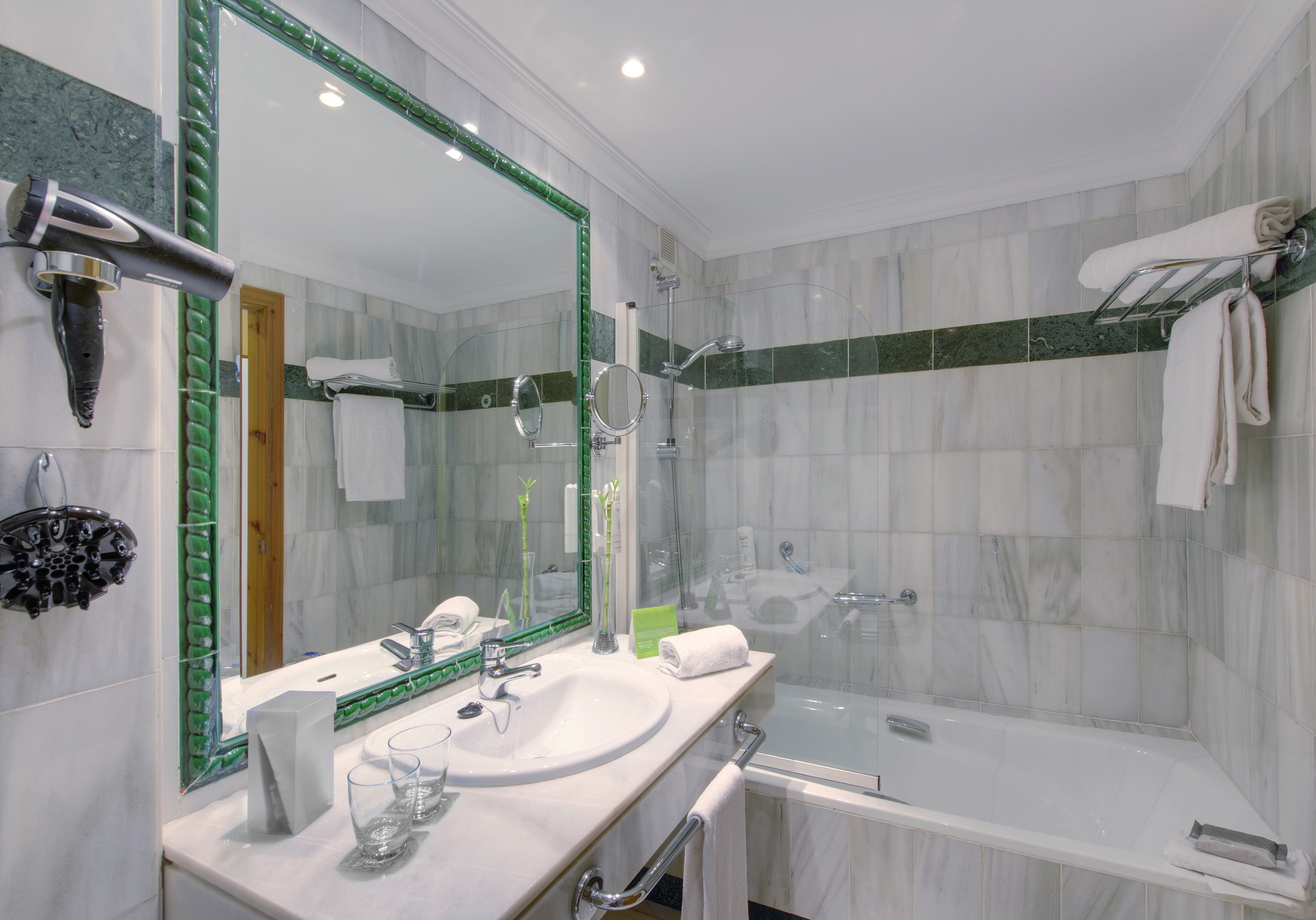 a bathroom with a large mirror