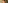 Smiling toddler peeks from colorful jungle play tent during playtime.