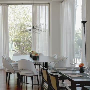 a room with a table and chairs