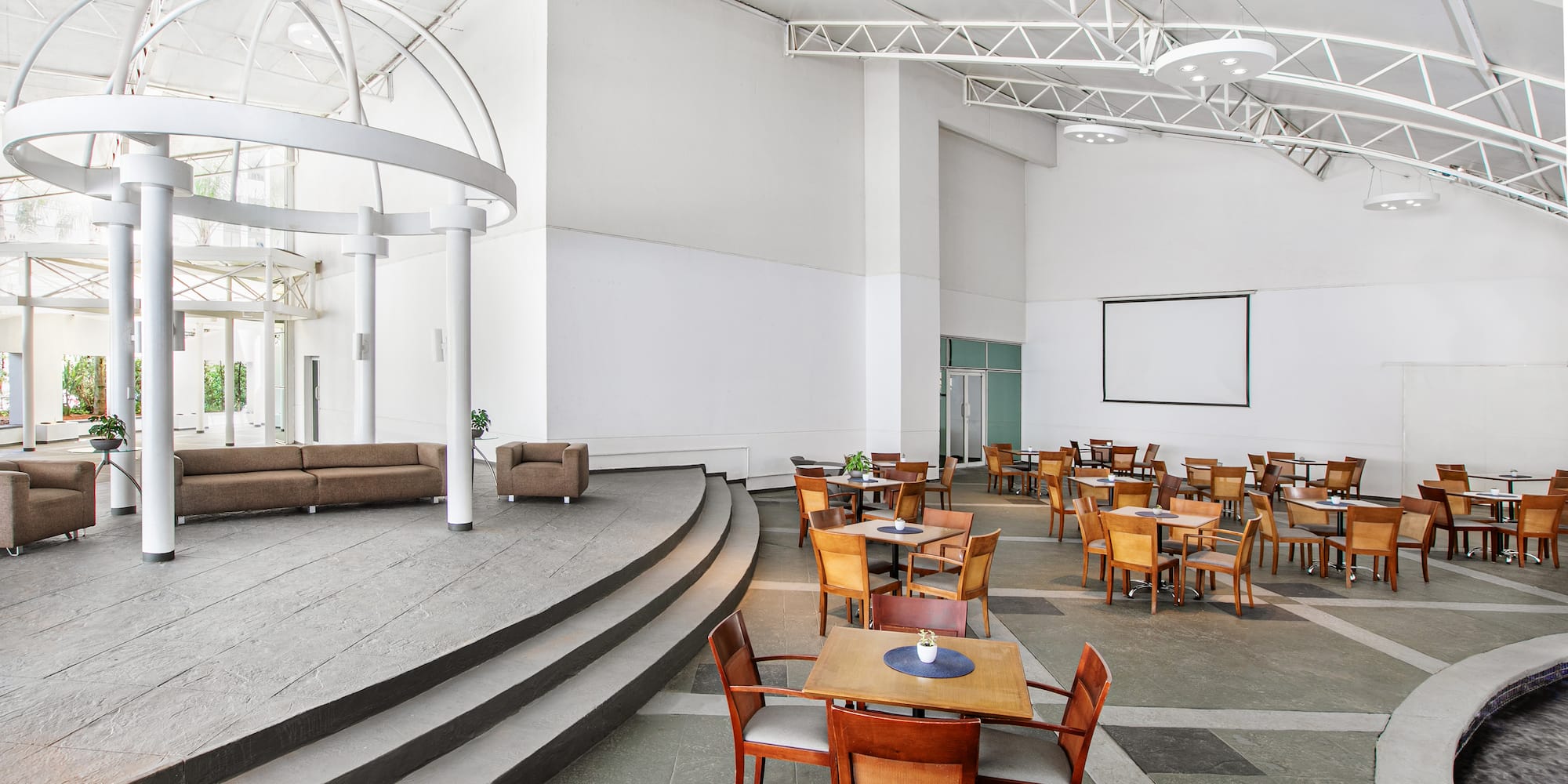 a room with tables and chairs