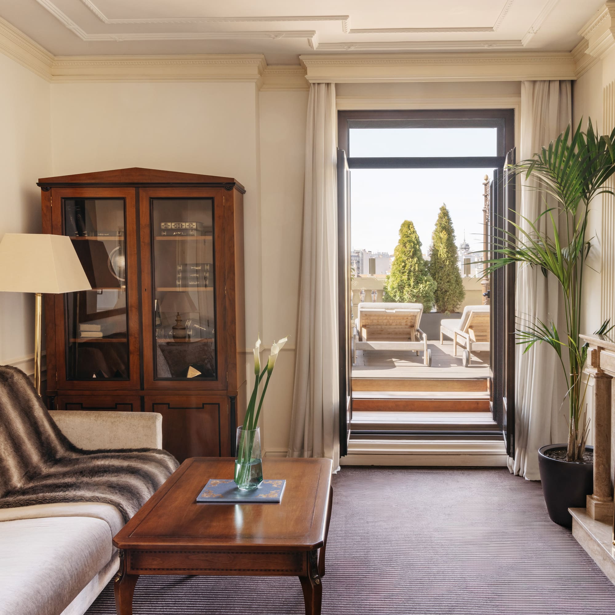 a living room with a couch and a table.