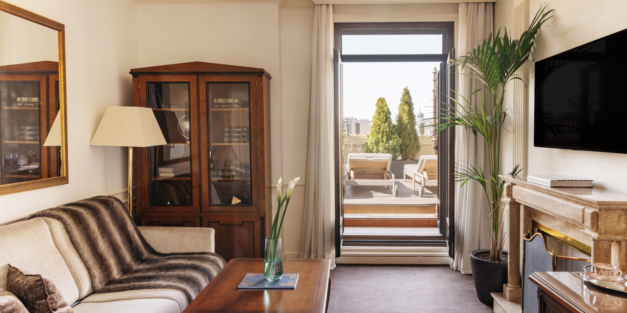 a living room with a couch and a table