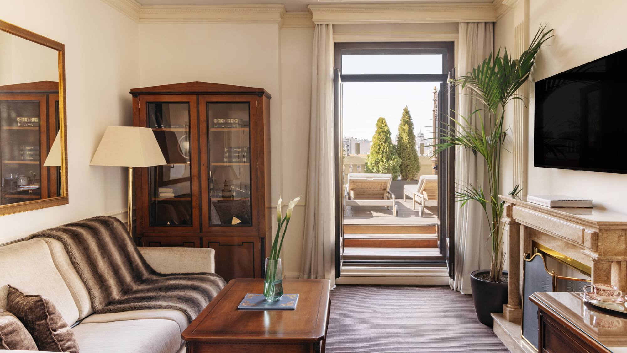 a living room with a couch and a table.