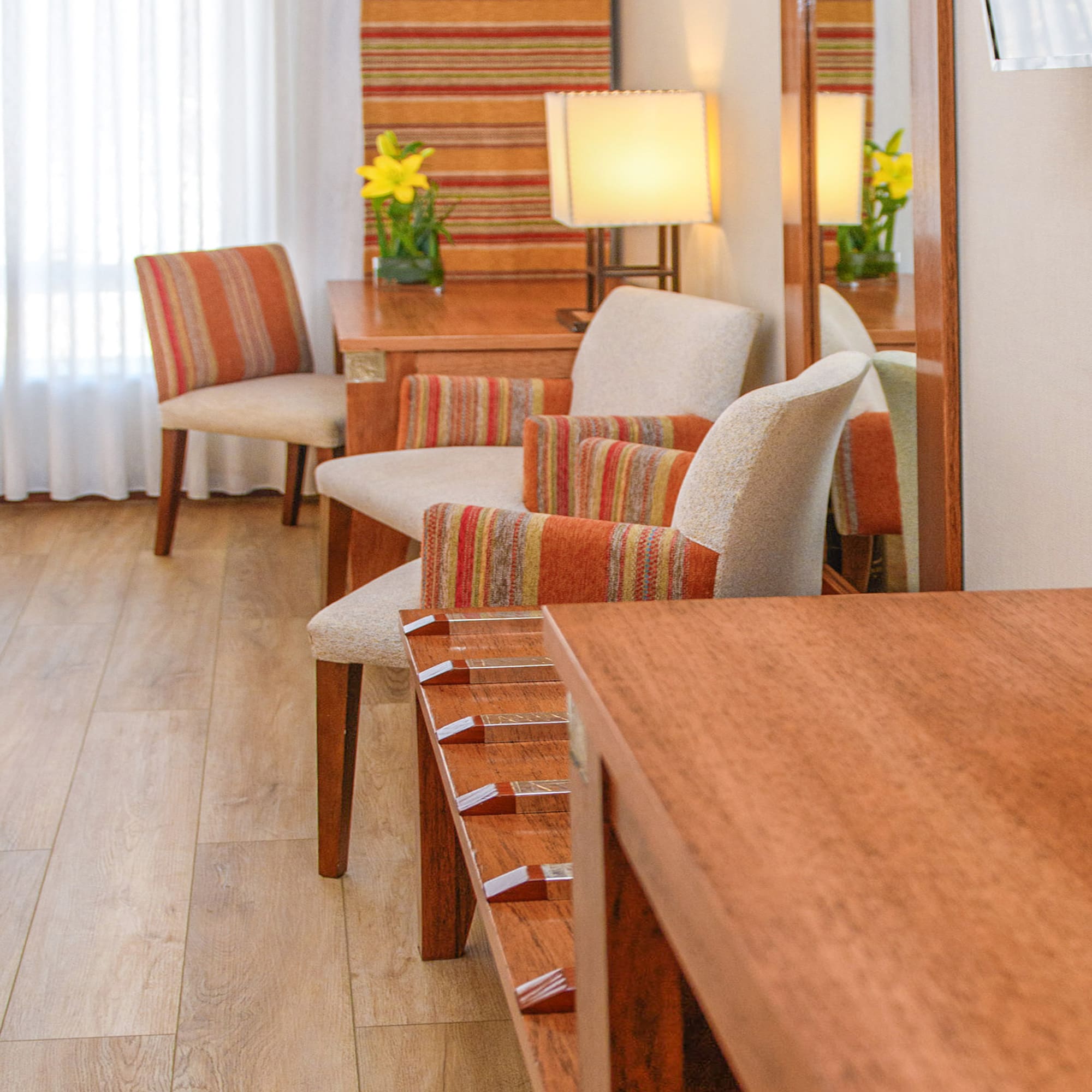 a room with chairs and a table