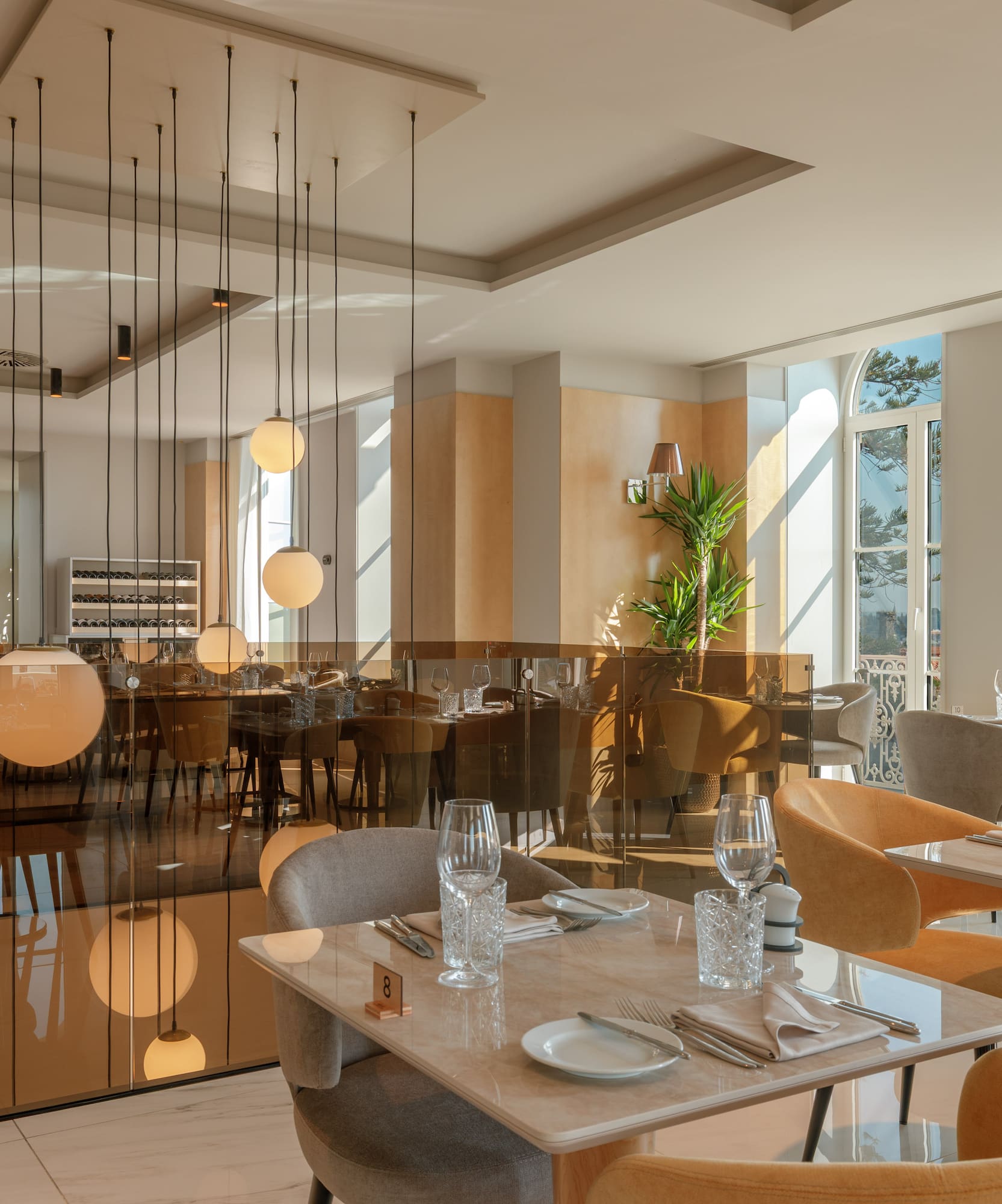 a restaurant with tables and chairs