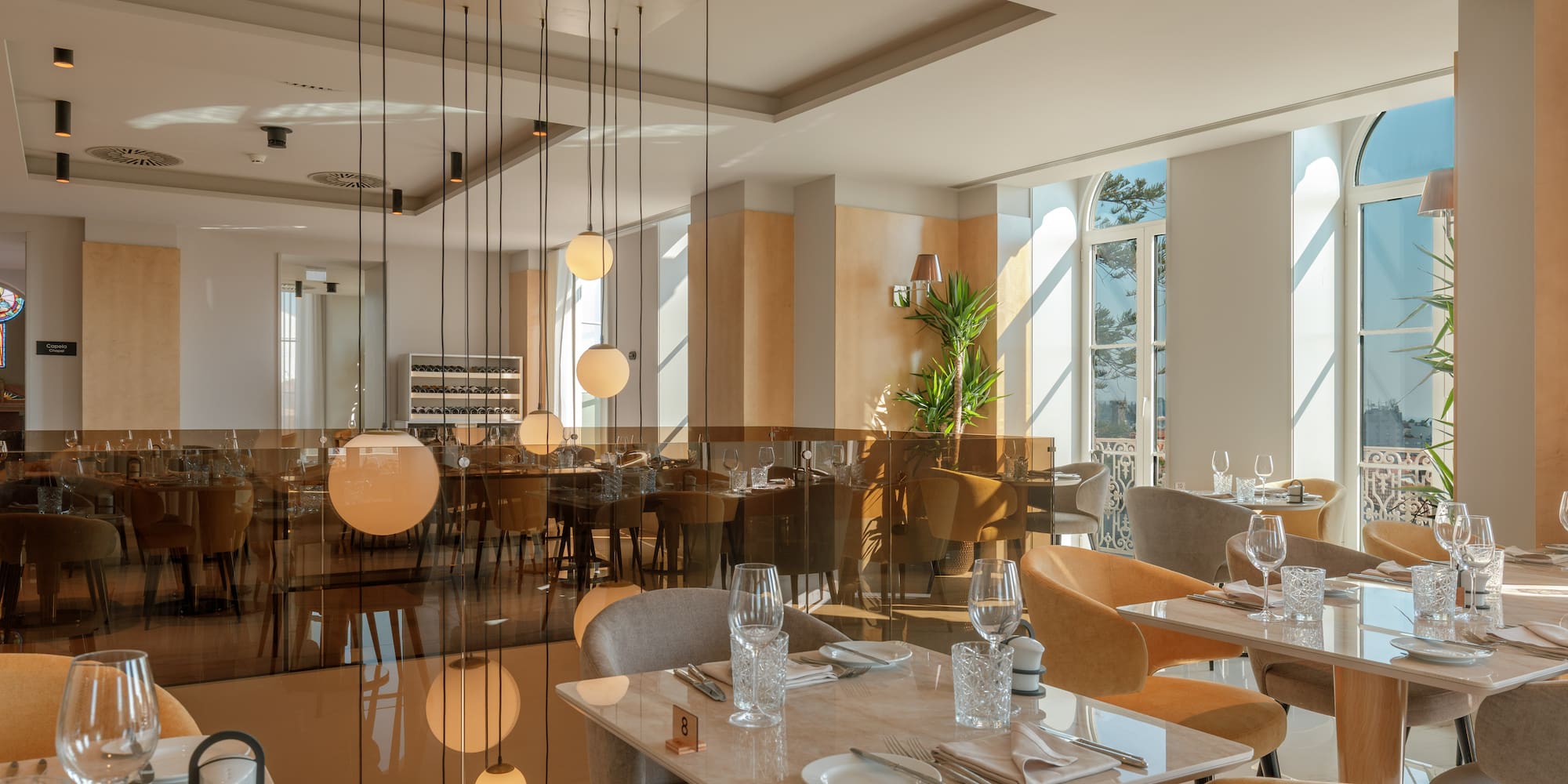 a restaurant with tables and chairs