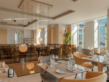 a restaurant with tables and chairs