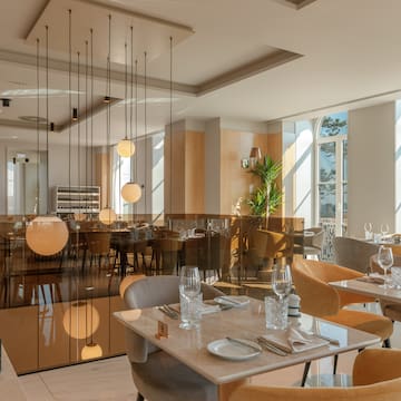 a restaurant with tables and chairs