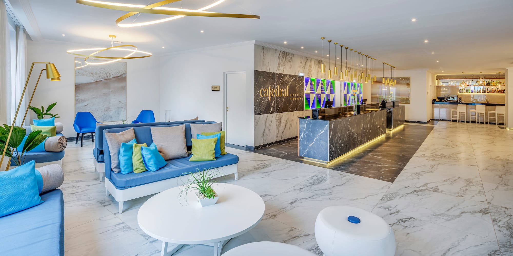 a lobby with a marble floor and a marble counter