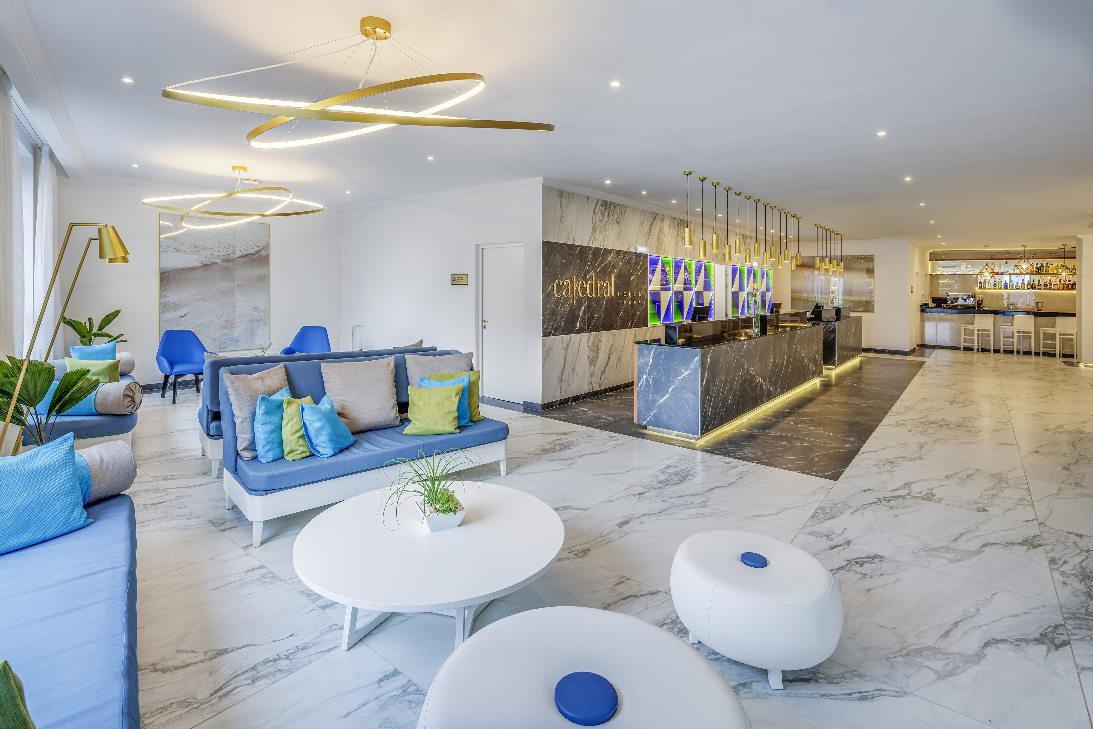 a lobby with a marble floor and a marble counter