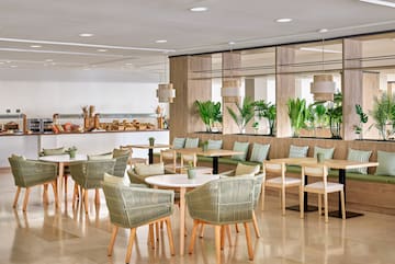 a room with tables and chairs