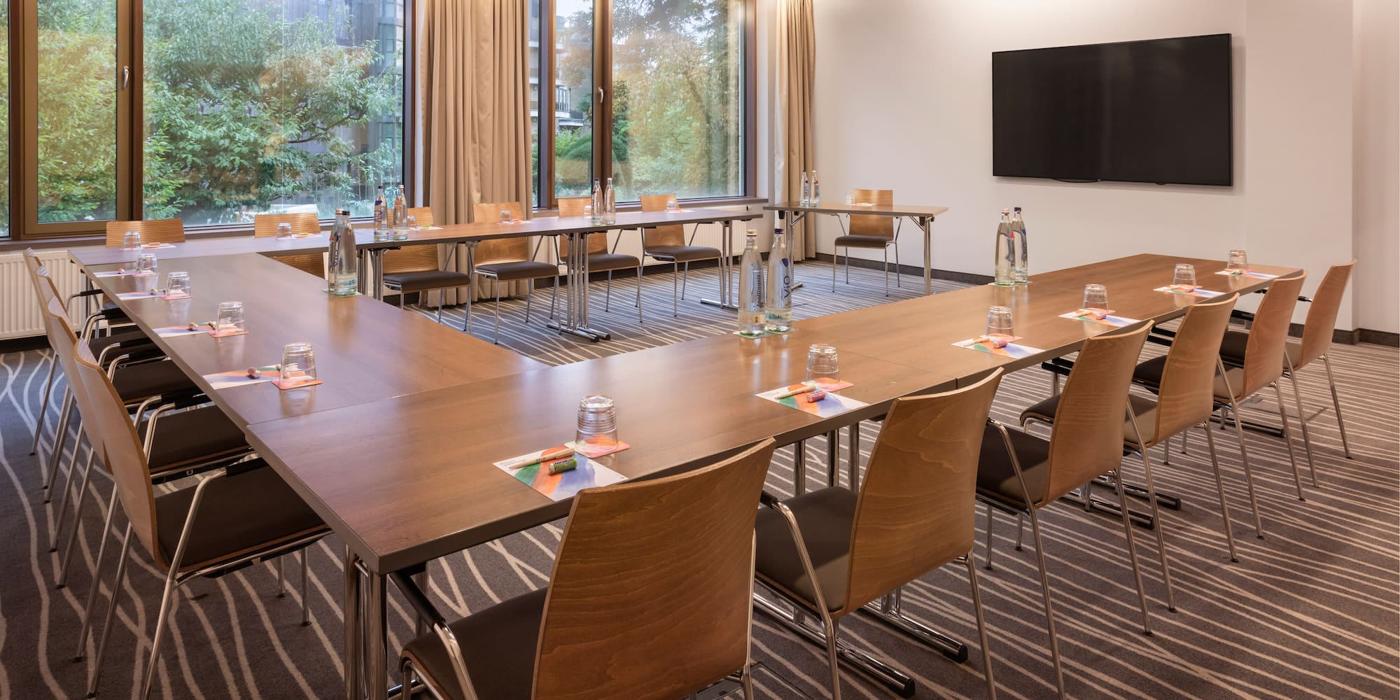 a room with tables and chairs