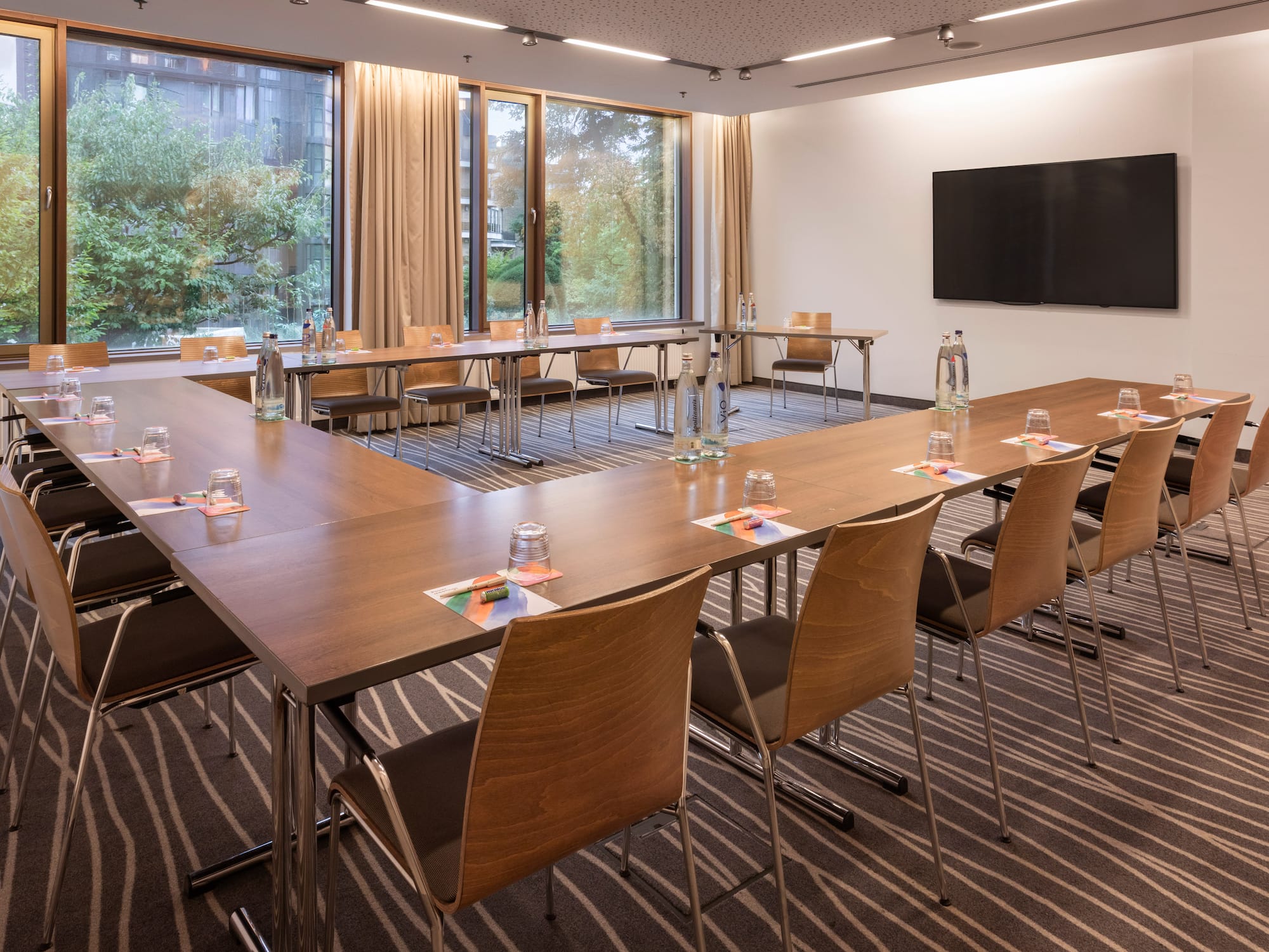 a room with tables and chairs