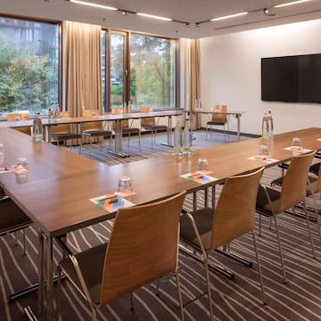 a room with tables and chairs