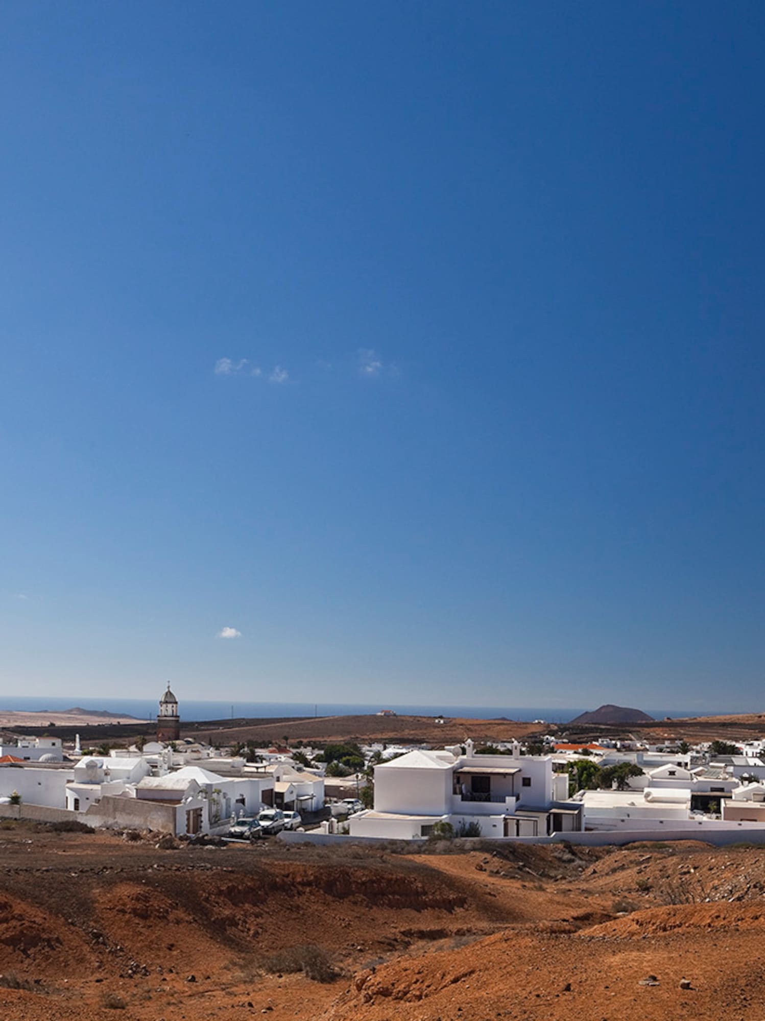 a white buildings in a desert