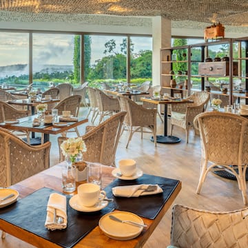 a restaurant with tables and chairs