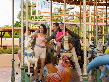 a group of people on a carousel