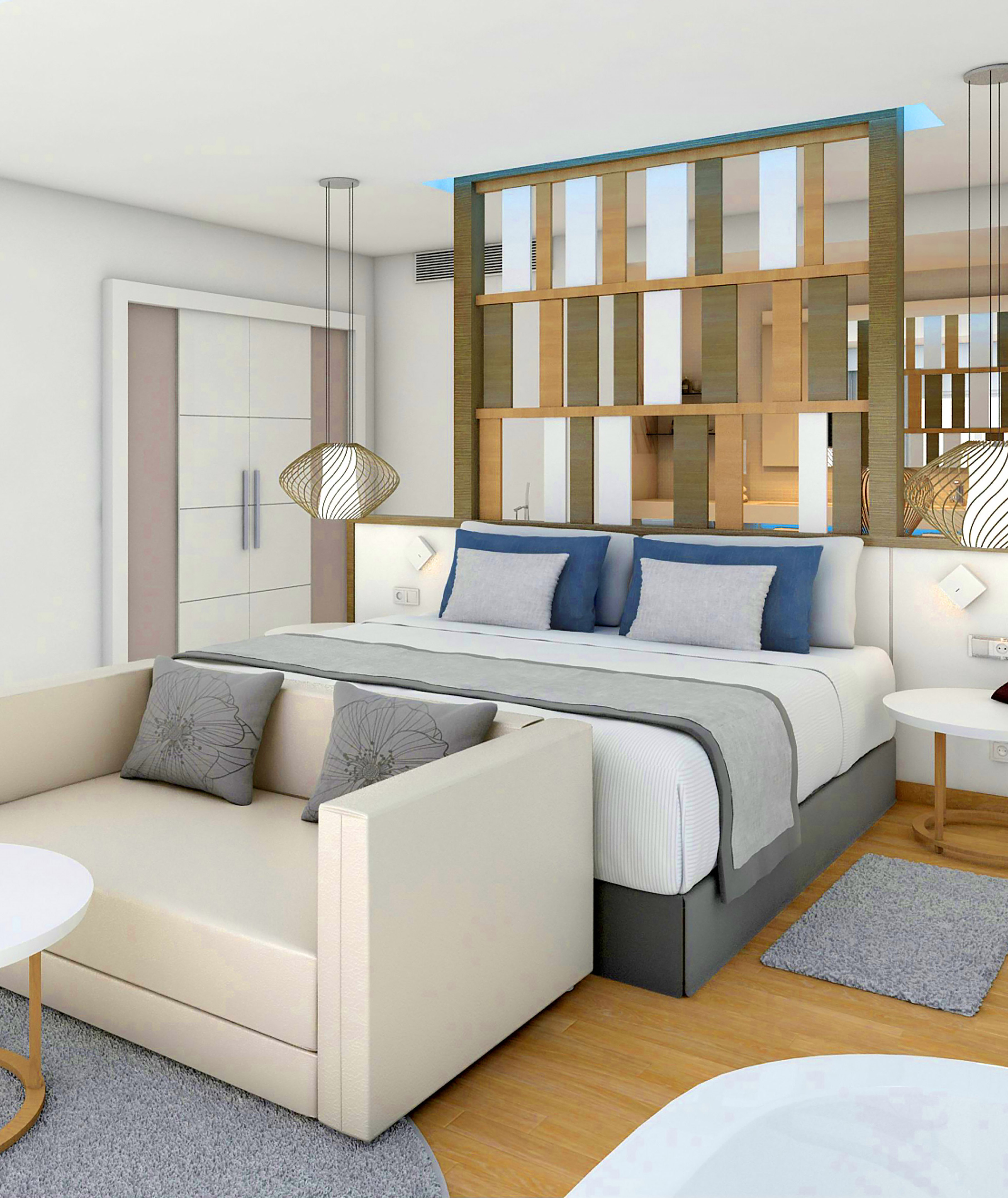 a bedroom with a bed and a couch