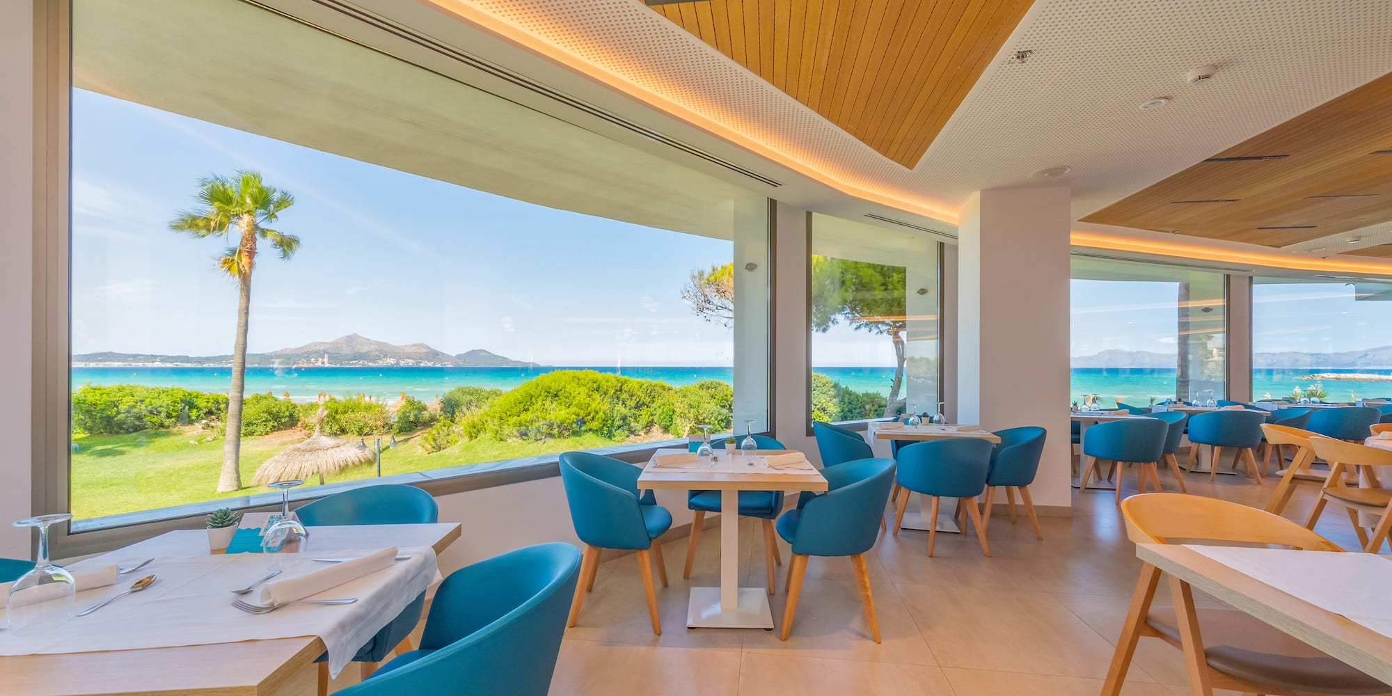 a restaurant with tables and chairs