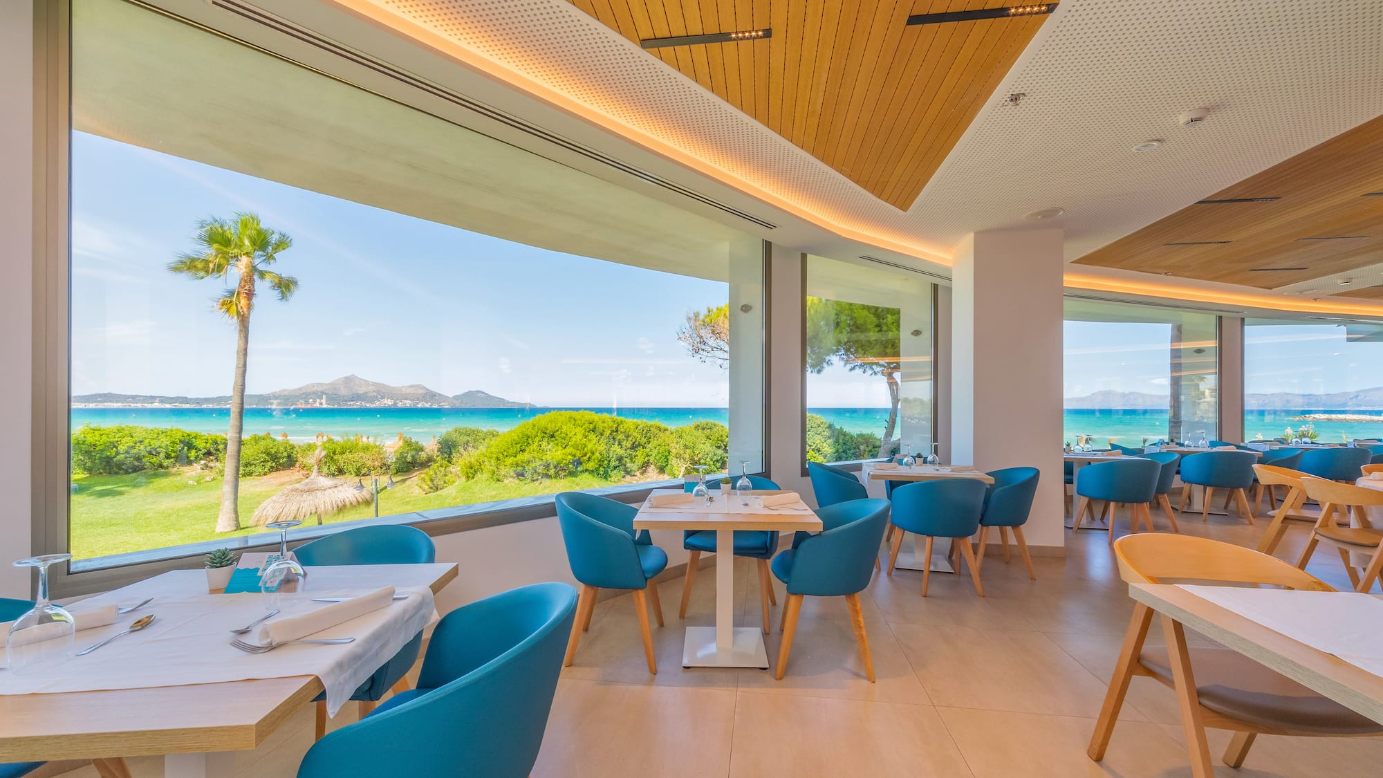 a restaurant with tables and chairs