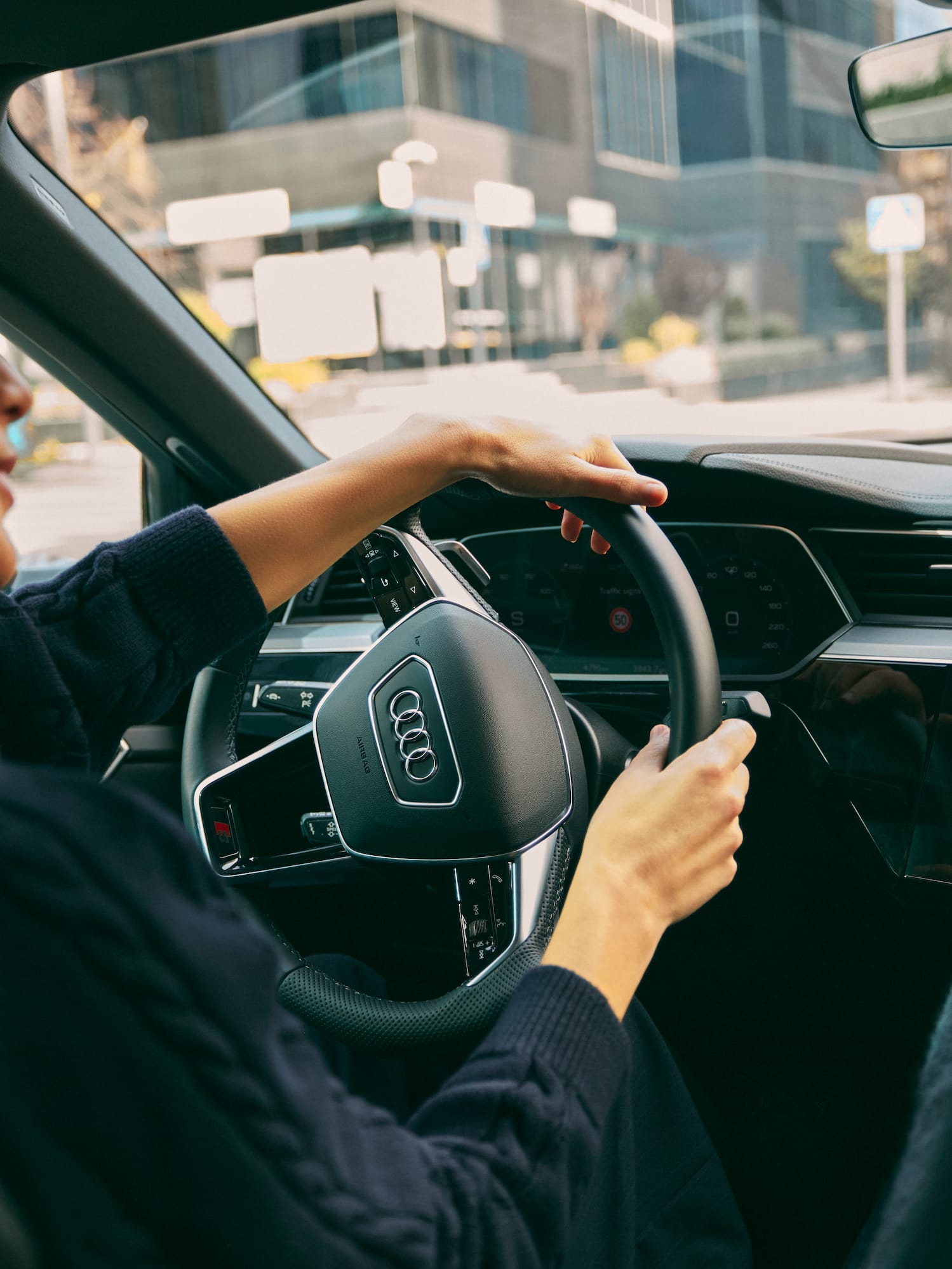 a woman driving a car