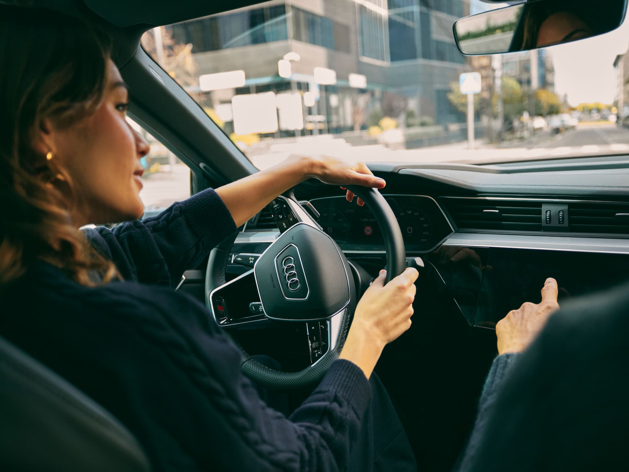 a woman driving a car