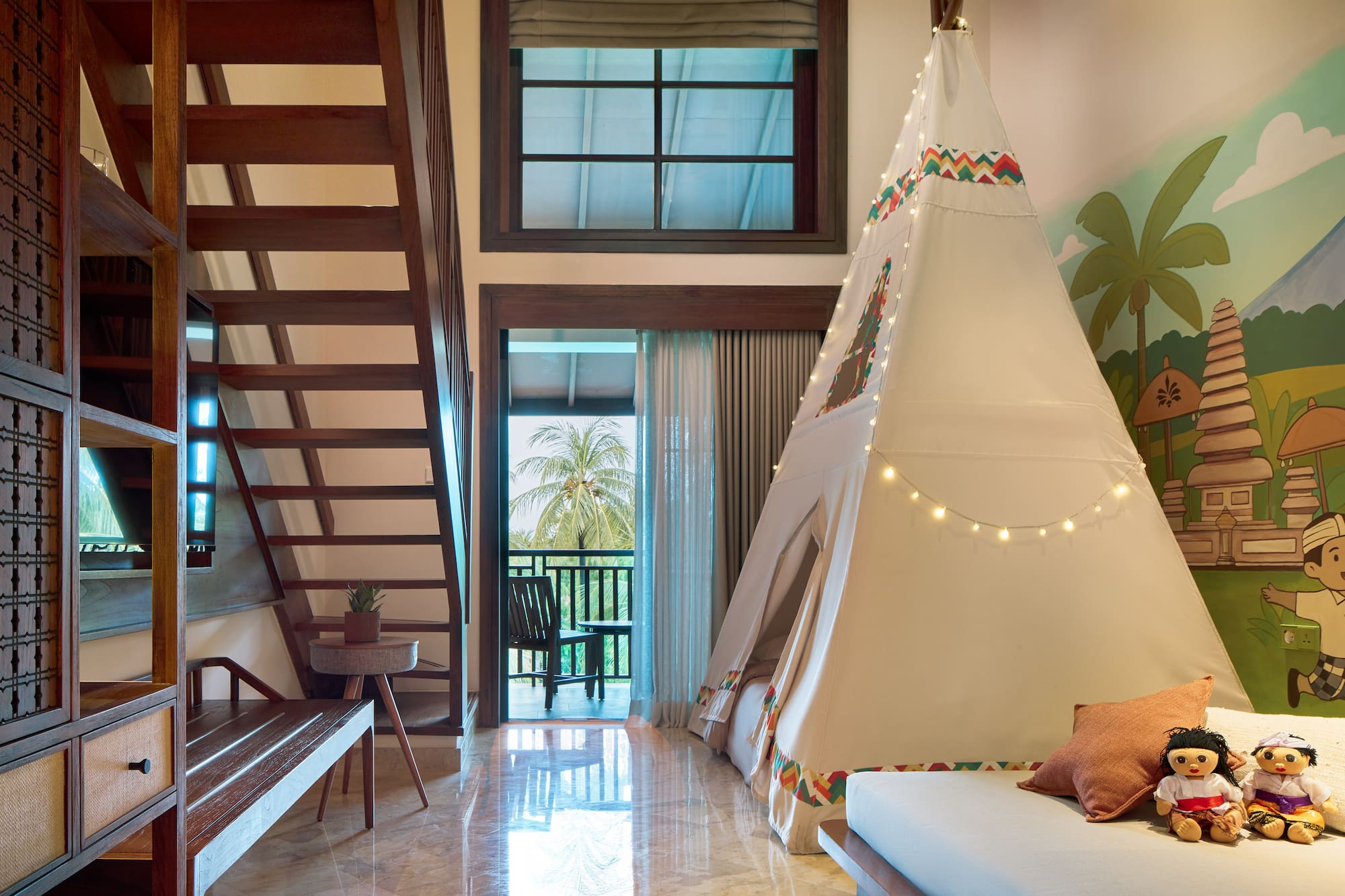 a room with a teepee and a bed