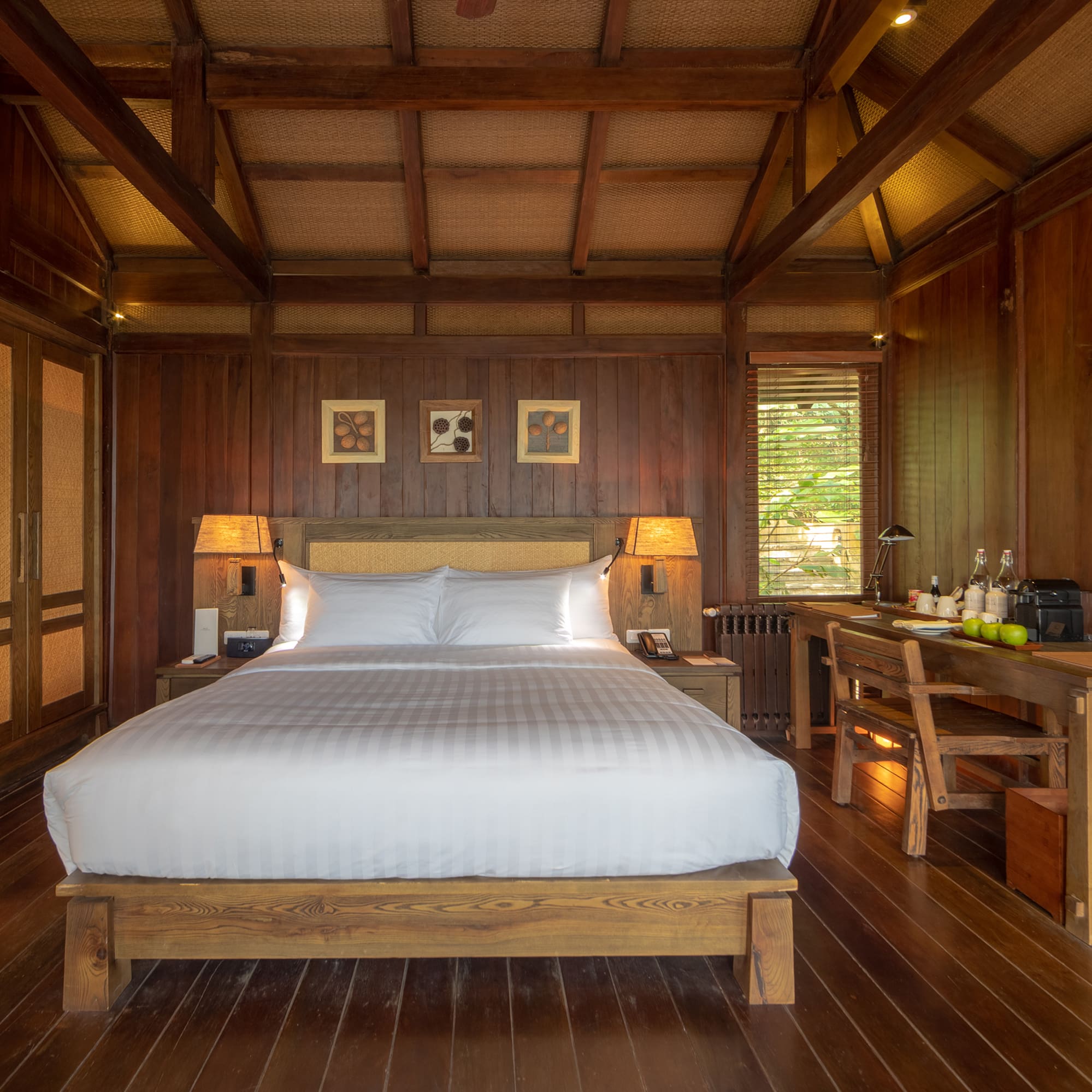 a room with a bed and a desk