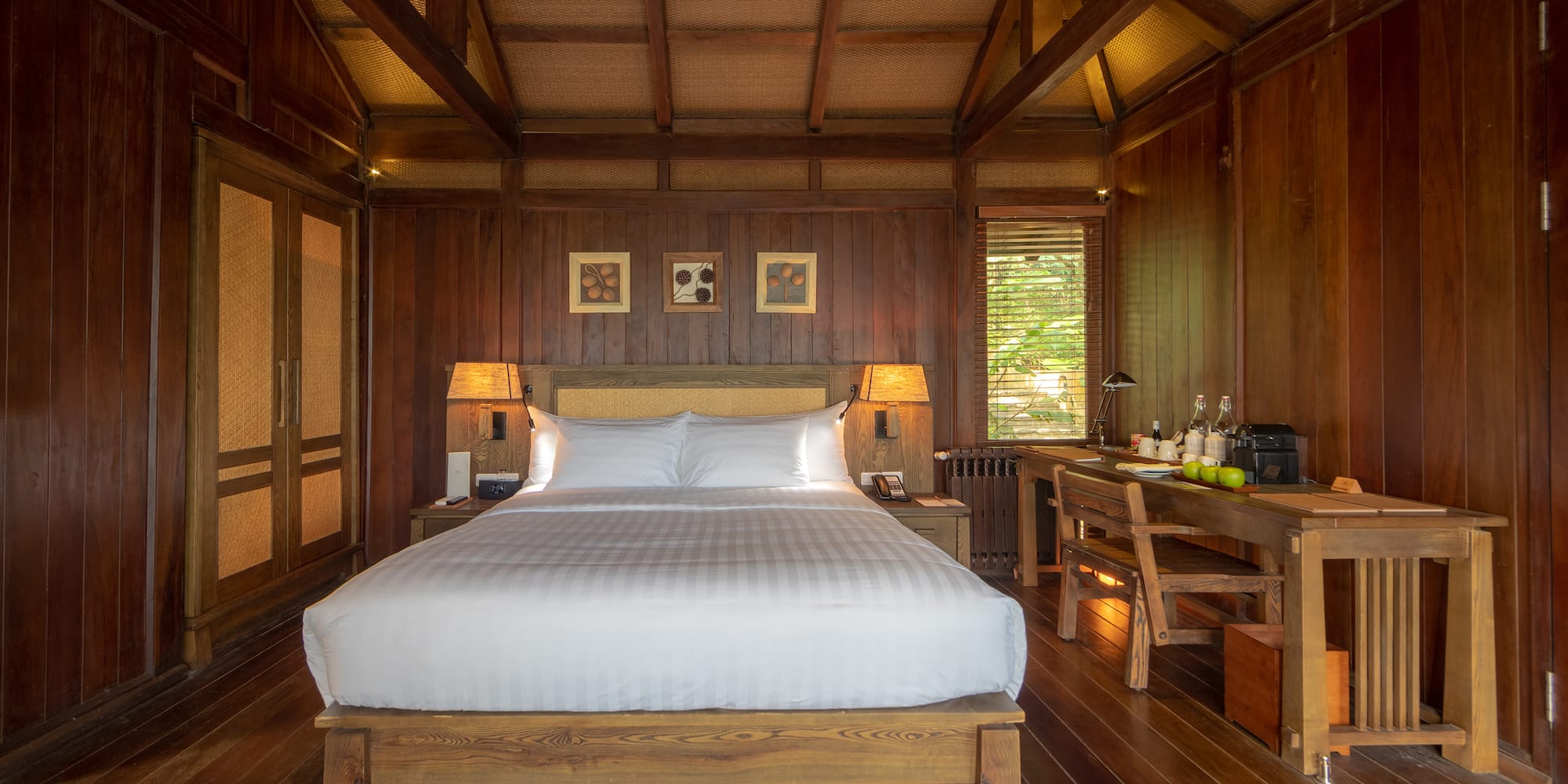 a room with a bed and a desk